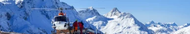 Luxury Everest and Gokyo Lake Trek - A professional helicopter flying near the snow-capped peak of Mount Everest in the Himalayan mountains, highlighting a luxury aerial sightseeing tour in Nepal